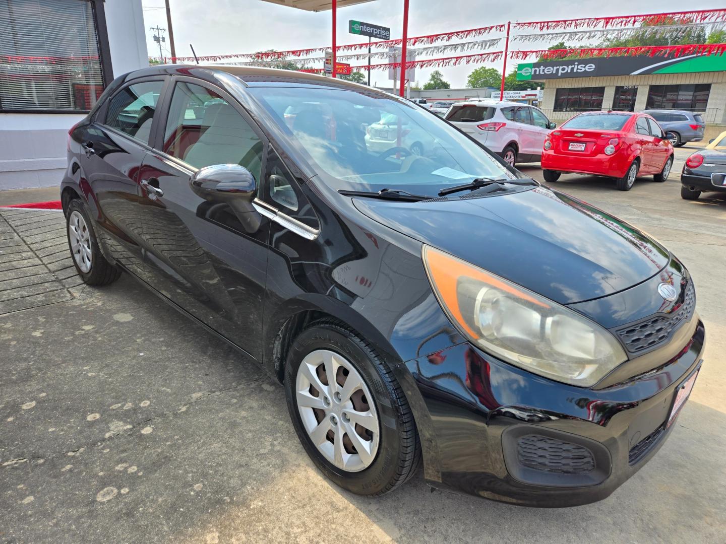 2012 Black Kia Rio (KNADM5A30C6) with an 1.6L I4 F DOHC 16V engine, Automatic transmission, located at 503 West Court, Seguin, TX, 78155, (830) 379-3373, 29.568621, -97.969803 - Photo#1